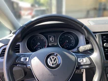 VW Golf Sportsvan Comfortline TSI in Cranberry Red Metallic