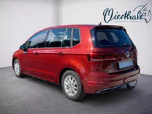 VW Golf Sportsvan Comfortline TSI in Cranberry Red Metallic