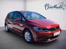 VW Golf Sportsvan Comfortline TSI in Cranberry Red Metallic