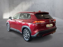 Toyota Corolla Cross 2,0 Hybrid Lounge 2WD in mittelrot - metallic