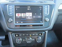 VW Tiguan Highline TDI SCR 4MOTION DSG in Ruby Red Metallic