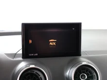 Audi Q2 30 TDI intense in tangorot metallic