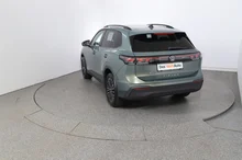 VW Tiguan Friends TDI DSG in Cipressino-Grün Metallic