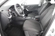 Audi Q2 30 TDI admired in GLETSCHERWEISS METALLIC