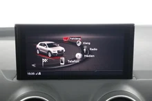 Audi Q2 30 TDI admired in GLETSCHERWEISS METALLIC
