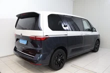 VW Multivan Business Plus eHybrid 180 kW 4M in Candyweiß / Starlight Blue Metallic