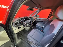 VW Multivan Business ÜH eHybrid 180 kW 4M in Candyweiß / Starlight Blue Metallic