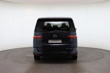 VW Multivan Business ÜH eHybrid 180 kW 4M in Starlightblue Metallic
