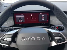 Škoda Peaq Sportline 90x in Rosewood-Beige Metallic