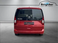 VW Caddy Family TSI in Sunsetred Metallic