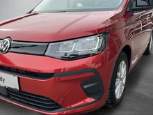 VW Caddy Family TSI in Sunsetred Metallic