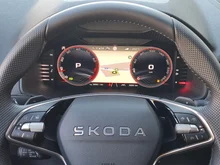 Škoda Karoq Sportline TSI DSG ACT in Phoenix-Orange Metallic