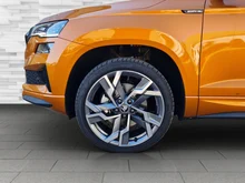 Škoda Karoq Sportline TSI DSG ACT in Phoenix-Orange Metallic