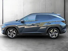 Hyundai Tucson 1,6 T-GDI Hybrid 2WD Prestige Line Aut. in dunkelblau - metallic