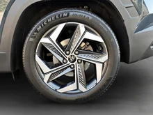 Hyundai Tucson 1,6 T-GDI Hybrid 2WD Prestige Line Aut. in dunkelblau - metallic