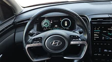 Hyundai Tucson 1,6 T-GDI Hybrid 2WD Prestige Line Aut. in dunkelblau - metallic