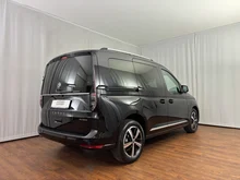 VW Caddy Style eHybrid 110 kW in Deepblack Perleffekt