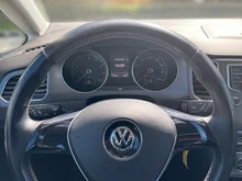 VW Golf Sportsvan Lounge BMT TSI in limestone grey met.