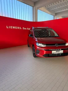 VW Caddy Business Plus Maxi eHybrid 110 kW in Sunsetred Metallic