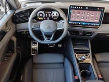 VW Tiguan Sport eHybrid DSG 200 kW in Cipressino-Grün Metallic