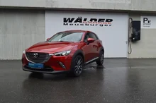 Mazda CX-3 Revolution AWD in rot met