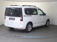 VW Caddy Family TSI in Candyweiß