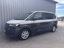 VW Multivan Business eHybrid 180 kW 4MOTION in Candyweiß / Starlight Blue Metallic