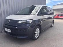 VW Multivan Business eHybrid 180 kW 4MOTION in Candyweiß / Starlight Blue Metallic