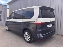 VW Multivan Business eHybrid 180 kW 4MOTION in Candyweiß / Starlight Blue Metallic