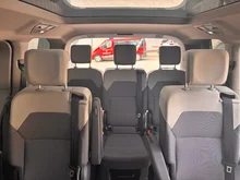 VW Multivan Business eHybrid 180 kW 4MOTION in Candyweiß / Starlight Blue Metallic