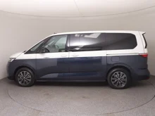 VW Multivan Style ÜH eHybrid 180 kW 4MOTION in Candyweiß / Starlight Blue Metallic