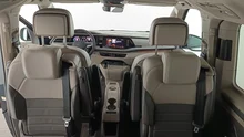 VW Multivan Style ÜH eHybrid 180 kW 4MOTION in Candyweiß / Starlight Blue Metallic