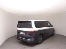 VW Multivan Style ÜH eHybrid 180 kW 4MOTION in Candyweiß / Starlight Blue Metallic