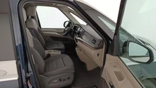 VW Multivan Style ÜH eHybrid 180 kW 4MOTION in Candyweiß / Starlight Blue Metallic