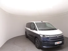 VW Multivan Style ÜH eHybrid 180 kW 4MOTION in Candyweiß / Starlight Blue Metallic