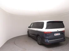 VW Multivan Style ÜH eHybrid 180 kW 4MOTION in Candyweiß / Starlight Blue Metallic