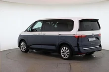 VW Multivan Style eHybrid 180 kW 4MOTION in Candyweiß / Starlight Blue Metallic