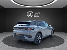 VW ID.4 GTX 4MOTION 250 kW Business -77 kWh in Mondsteingrau Dach schwarz